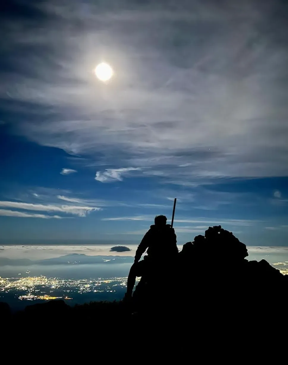 Climbing under the moonlit sky